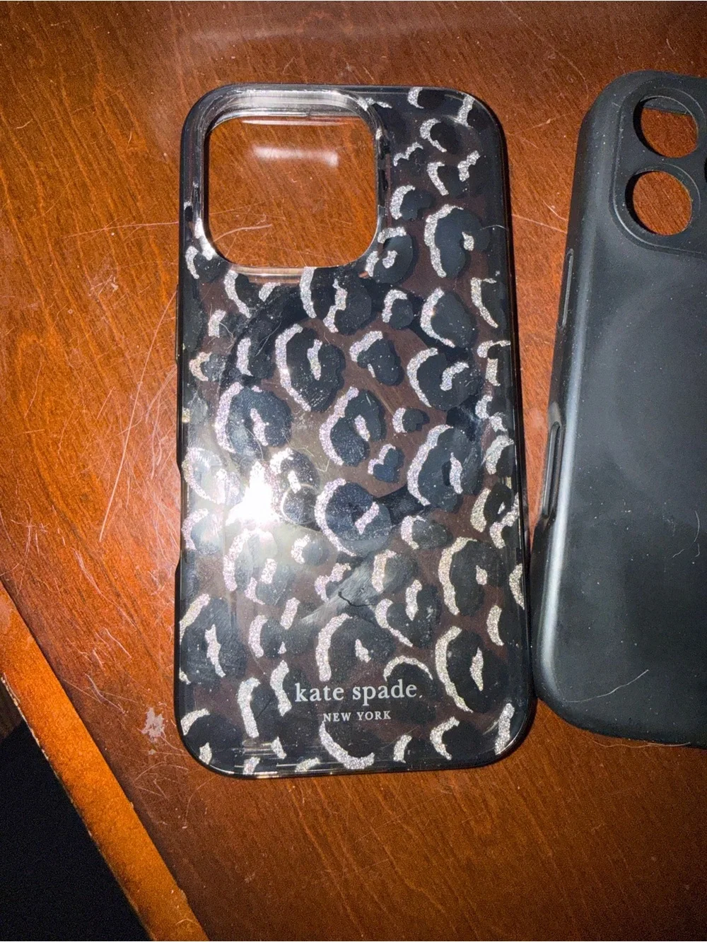 Four iPhone 16 pro cases - mag safe - leopard is Kate Spade.